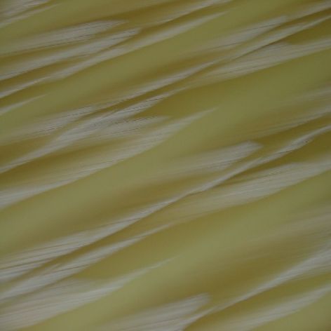 acetato de celulosa que imita los colores amarillo verdosos y los veteados del marfil