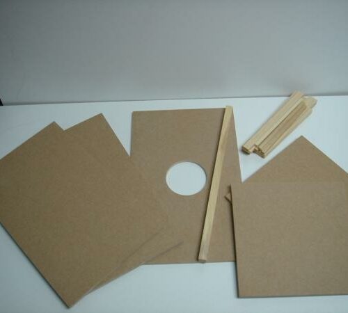 imagen de todas las piezas de MDF incluidas en el kit para montar un cajón flamenco